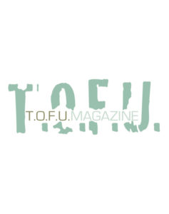 Image contains a white background with pale green text in the middle. In large letters, the word "T.O.F.U." is written across the width of the image. Within this text, the words "T.O.F.U. Magazine" are written in a smaller font.